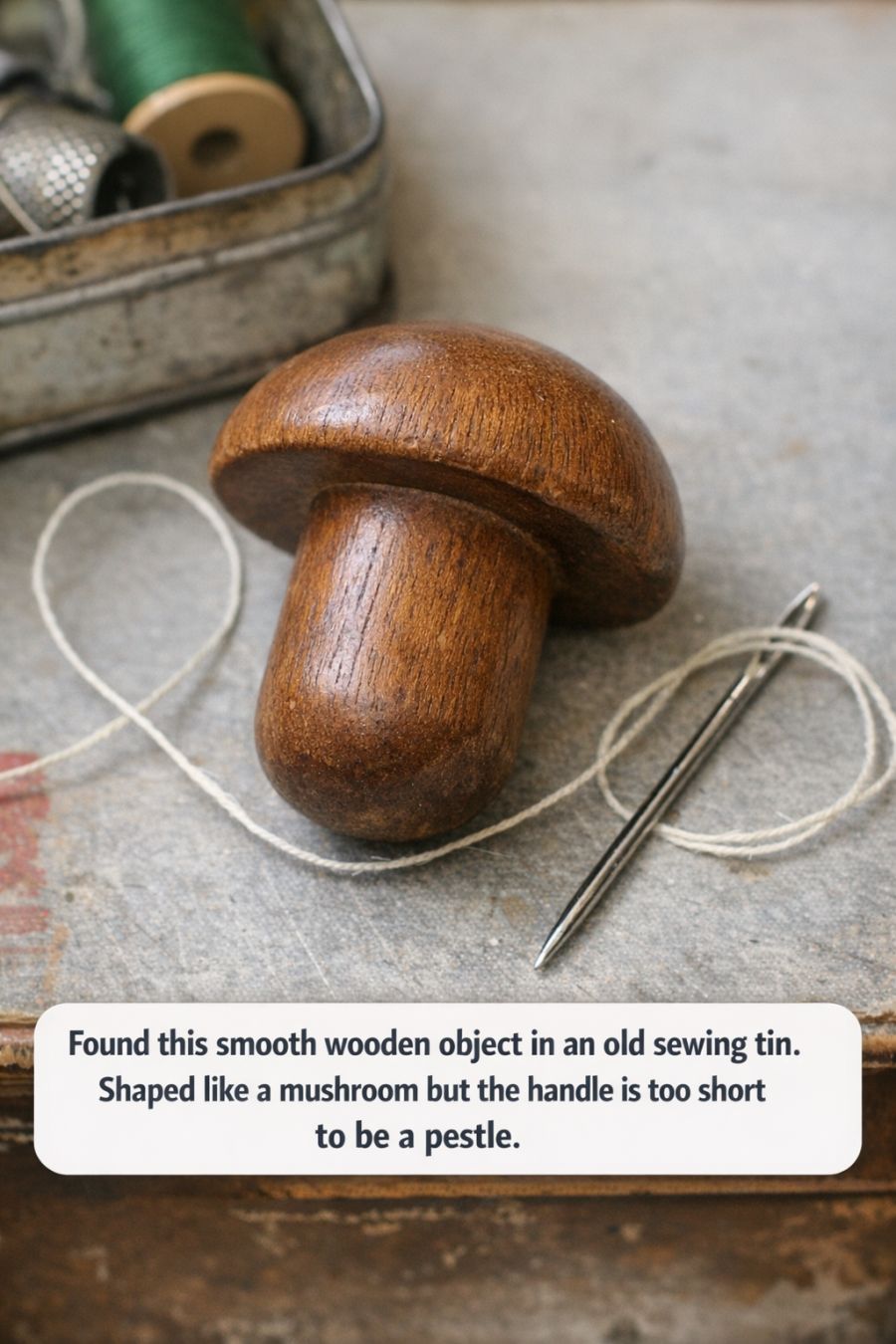 In the world of antiques and vintage finds, the thrill of unearthing an unfamiliar object can lead to delightful discoveries and a peek into the past. While rummaging through an old sewing tin, you might stumble upon objects that seem curious at first glance. Among the spools of thread, buttons, and needles, there’s one smooth wooden object that stands out due to its unusual shape, reminiscent of a mushroom. This wooden item, likely used for a purpose long forgotten by many, beckons with questions about its origins and function. Its presence in a sewing tin suggests a practical use, yet its design hints at more than just utility. This article delves into the mystery of this object, exploring its history and function, and in doing so, uncovers a piece of our cultural heritage that is both fascinating and instructive. Advertisement 1. The Curious Find: A Smooth Wooden ‘Mushroom’ in a Sewing Tin Upon first inspection, the object is smooth to the touch, with a rounded cap sitting atop a short handle. The cap measures approximately 3 inches in diameter, while the handle is about 2 inches long, making it too diminutive to serve as a pestle. The wood, often polished to a fine sheen, suggests significant handling, indicative of frequent use. Its shape, reminiscent of a mushroom, provides no immediate clues about its purpose. The fact that it resides in a sewing tin, however, suggests that it holds a specialized function related to textiles. This context is crucial for identifying its role, as many sewing tools from previous eras were crafted with both utility and durability in mind. 2. Why It’s Not a Pestle: Shape, Size, And Tell-Tale Details The natural assumption might be to consider this object a pestle, given its handheld size and smooth surface. However, its short handle and broad cap are not practical for the grinding or crushing tasks typically associated with a pestle. Most pestles have elongated handles that provide leverage for grinding. In contrast, this object’s design is optimized for a different kind of manual task. The smooth, rounded cap would not provide the necessary pressure or control needed for grinding spices or herbs, which requires a more robust and elongated tool. 3. Meet the Darning Mushroom: A Vintage Mending Essential The object in question is a darning mushroom, a tool that was once an essential item in every household. Used primarily for repairing socks and stockings, darning mushrooms provided a stable surface to sew on, simulating the foot’s shape and allowing for easier manipulation of the fabric. In the past, when socks were not as disposable as today, repairing them was a common household task. The darning mushroom was a ubiquitous tool, found in sewing kits across the world, each with slight regional variations in design, but all serving the same purpose. 4. How Darning Mushrooms Were Used to Repair Socks and Stockings To use a darning mushroom, the damaged sock or stocking would be placed over the rounded cap. The smooth surface allowed the fabric to stretch evenly, making it easier to see the area that needed mending. With the fabric taut, a darning needle and thread would be used to weave through the hole, creating a patch that restored the item to usability. This method of repair, known as darning, involves weaving a new piece of fabric by integrating the old threads with new ones. It was a skill passed down through generations, part of the domestic arts that kept family clothing in serviceable condition much longer than today’s fast fashion. 5. Design Features: Short Handle, Rounded Cap, And Smooth Finish The darning mushroom’s cap is intentionally rounded and smooth, allowing fabric to glide across its surface without snagging. This design was crucial for maintaining the integrity of the textile fibers during repair. The short handle provides just enough grip to hold the tool steady while working. Wooden darning mushrooms were often made from hardwoods like beech or maple, chosen for their durability and smooth finish. Some were plain, while others might have been decorated with simple carvings or paint, adding a touch of personal flair to an otherwise utilitarian tool. 6. Clues From Context: What Old Sewing Tins Reveal About Their Tools Old sewing tins often contain a mix of practical tools and sentimental items, reflecting the era and household from which they originate. The presence of a darning mushroom among needles, thimbles, and thread suggests a time when repair and reuse were standard practices. Sewing tins themselves can be valuable indicators of the past, often passed down through generations. They might include inherited tools or items collected over a lifetime, each with its own story. The context of these items together provides a snapshot of domestic life in a particular time and place. 7. Variations on the Theme: Eggs, Mushrooms, And Other Darning Tools While the darning mushroom is a common variant, darning eggs are another popular tool used for similar purposes. Shaped like an egg, these tools also provide a rounded surface for mending fabric, often used interchangeably with mushrooms depending on personal preference. Some darning tools were whimsical in design, crafted to be visually pleasing as well as functional. They came in various sizes, materials, and even colors, reflecting both the availability of materials and the aesthetic preferences of their users. 8. How to Use a Darning Mushroom Today (Step-By-Step Overview) To use a darning mushroom today, start by placing the damaged part of the sock over the mushroom’s cap. Stretch the fabric until it’s taut but not overly tight, ensuring that the hole is centered. Thread a darning needle with yarn or thread that matches the fabric. Begin by sewing a series of vertical stitches over the hole, anchoring the thread in undamaged areas. Then, weave horizontal stitches over and under the vertical ones, creating a woven patch. This method ensures a sturdy repair that mimics the original fabric structure, extending the life of the item being mended. 9. Caring For and Restoring Old Wooden Sewing Tools To preserve the integrity of vintage wooden sewing tools like the darning mushroom, regular care is essential. Clean the wood with a soft, damp cloth to remove dust and grime. Avoid soaking the wood, as moisture can cause swelling or cracking. Periodically, apply a light coat of mineral oil or beeswax to nourish the wood and maintain its smooth surface. This will also help to prevent drying and cracking, ensuring that the tool remains functional and beautiful for years to come. 10. Collectible or Everyday Tool? Assessing Age, Value, And Rarity While darning mushrooms were once everyday household items, their status has shifted over time. Today, they are often considered collectible, valued for their historical significance and craftsmanship. The age, condition, and uniqueness of a darning mushroom can affect its value. Hand-carved or painted examples, or those with a known provenance, may be particularly sought after by collectors. However, even a simple, well-used darning mushroom holds value as a nostalgic piece of domestic history, representing an era when mending was a common skill. 11. Why Rediscovering Darning Tools Matters in the Age of Fast Fashion In today’s fast fashion era, the skills and tools associated with repairing clothing have largely been forgotten. Rediscovering tools like the darning mushroom encourages a return to sustainable practices, emphasizing the importance of repair and reuse.  Advertisement By learning to mend our clothes, we can reduce waste, save money, and preserve the craftsmanship of garments that would otherwise be discarded. The darning mushroom, once a staple in household sewing kits, is a symbol of a more thoughtful and sustainable approach to fashion and consumerism.