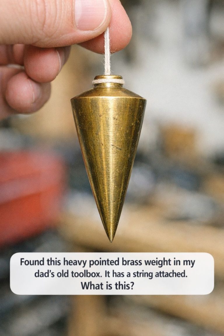 Found this heavy pointed brass weight in my dad’s old toolbox. It has a string attached. What is this?